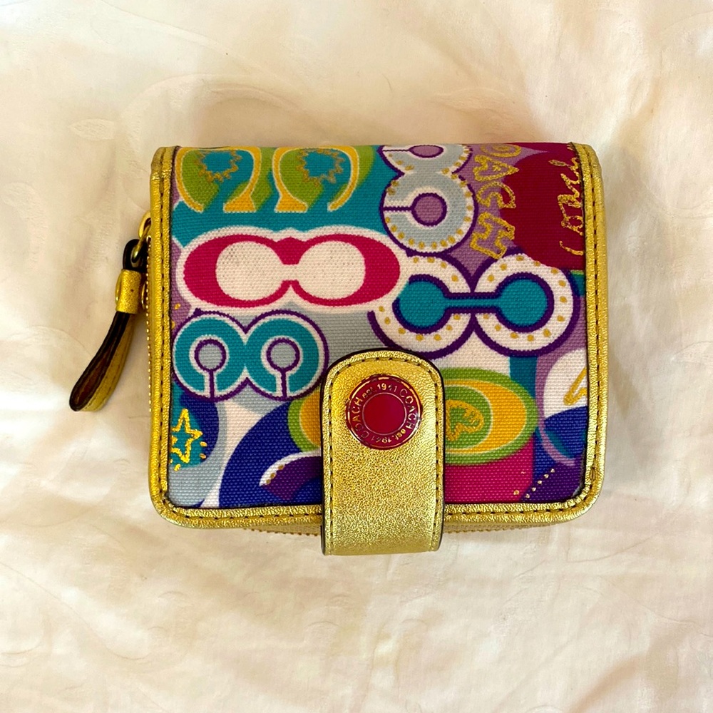 Women’s Coach multicolored square wallet.